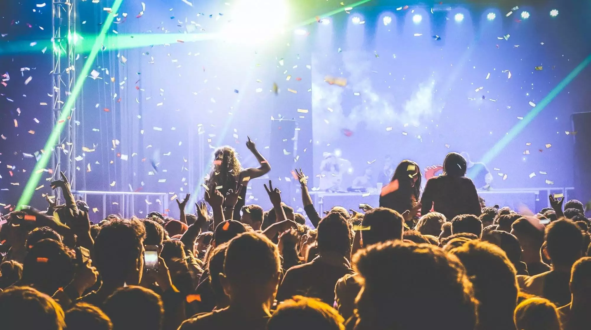 Inidentified people dancing at night club